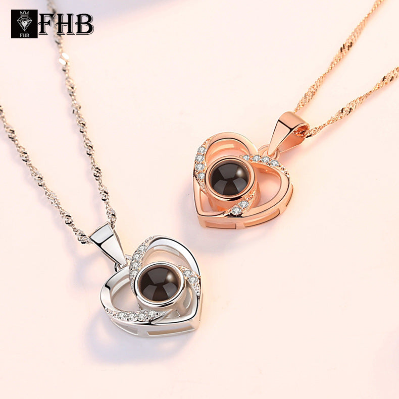 COLLAR DE CORAZÓN PROYECTOR DE LA PALABRA TE AMO EN 100 IDIOMAS